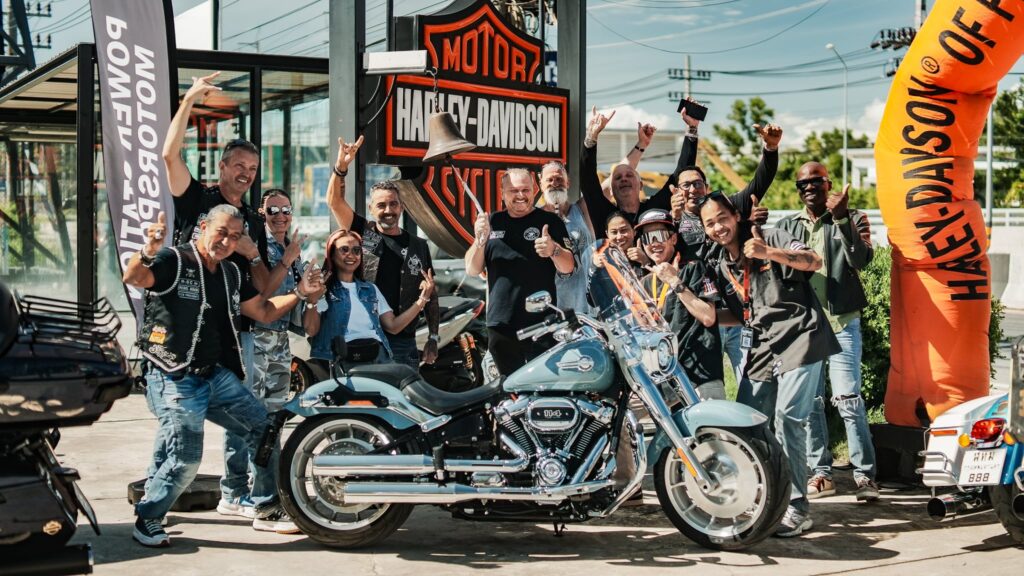 Friends gather with their motorcycles, capturing a moment of excitement for the first-ever Harley-Davidson brunch at Nikki Beach