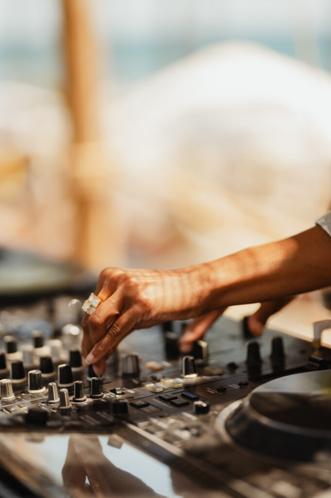 DJ MAR mixing on mixing decks