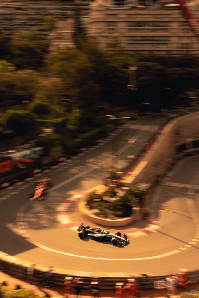 Formula one car going round a bend on the track